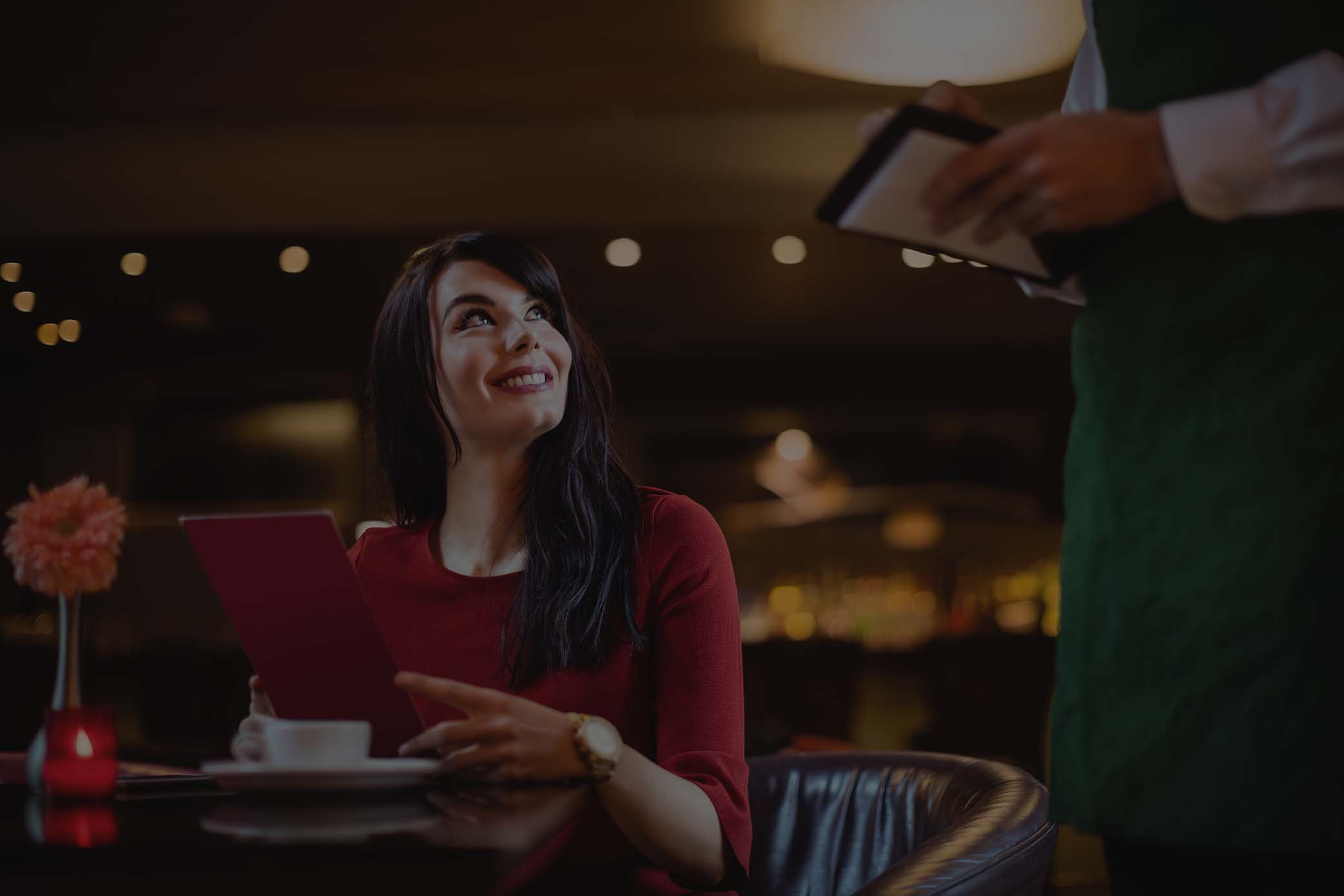 waiter taking order from woman low overlay